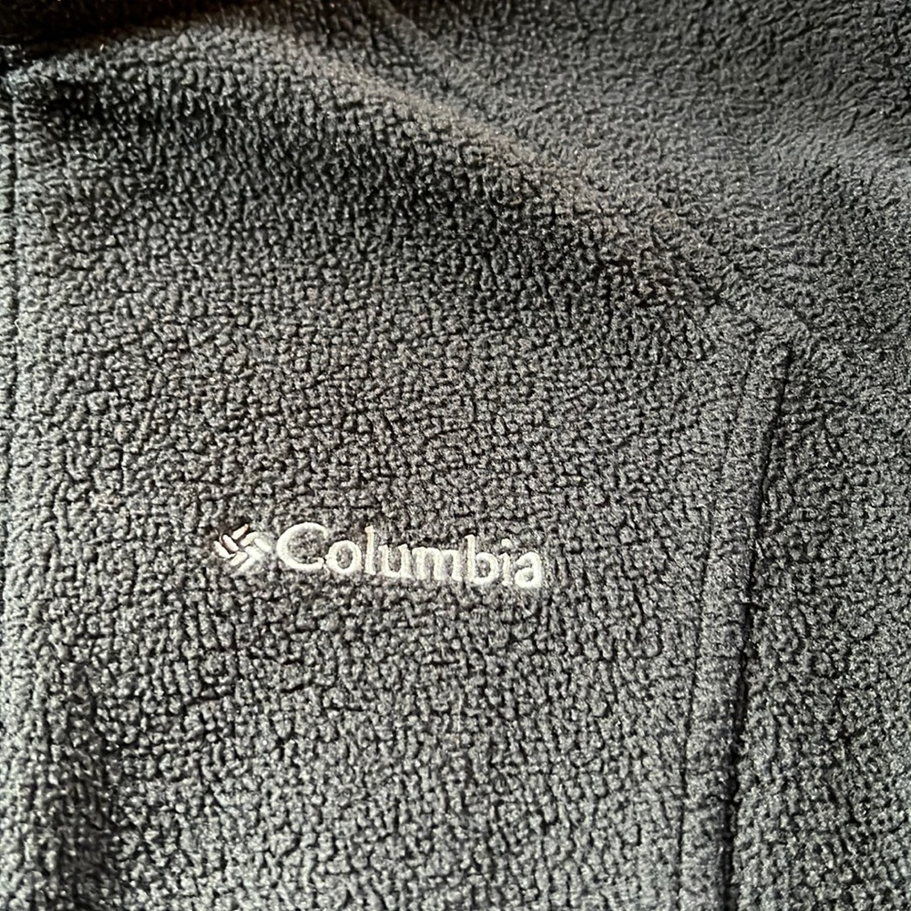 Columbia black fleece jacket size is medium lightly worn. Adjustable waist band.